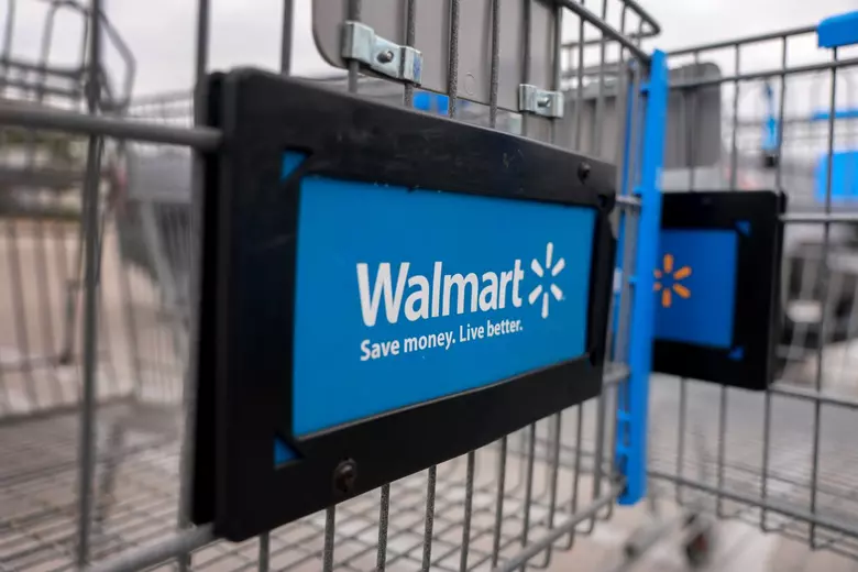 Walmart logo in a shopping wheel cart 